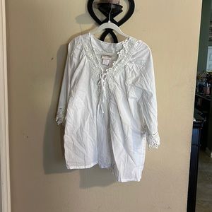 White gauzy summer top with lace detail and tie